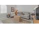 Cozy living room with modern decor, comfortable seating, and a woven trunk at 2140 Idaho Falls Dr, Henderson, NV 89044