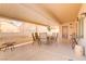Spacious covered patio with outdoor seating, offering a comfortable space for relaxing and entertaining guests at 2140 Idaho Falls Dr, Henderson, NV 89044