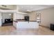 Spacious bar area with granite countertops, modern appliances, and ample seating, perfect for socializing and enjoying refreshments at 221 Mission Catalina Ln # 202, Las Vegas, NV 89107