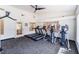 Well-equipped gym with treadmills, elliptical machines, and natural light, providing a convenient space for staying active at 221 Mission Catalina Ln # 202, Las Vegas, NV 89107