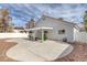 Backyard features a large concrete patio with pergola, perfect for outdoor entertaining and relaxation at 239 Highgate St, Henderson, NV 89074