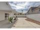 Spacious concrete backyard with covered pergola offers great outdoor living and entertaining space at 239 Highgate St, Henderson, NV 89074