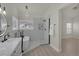 Modern bathroom featuring a sleek soaking tub, a frameless glass shower and stylish fixtures at 239 Highgate St, Henderson, NV 89074