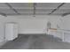 Spacious two-car garage offering ample storage and potential workshop area at 239 Highgate St, Henderson, NV 89074