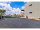 Expansive backyard featuring a modern home exterior, gravel landscaping and a privacy wall at 2827 Richmar Ave, Henderson, NV 89074
