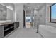 Open bathroom featuring a vanity, tub, and shower at 2827 Richmar Ave, Henderson, NV 89074