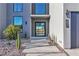 Inviting modern home with stylish desert landscaping, and a covered front entrance at 2827 Richmar Ave, Henderson, NV 89074