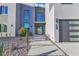 Modern home featuring a minimalist design, desert landscaping, and a welcoming front entrance at 2827 Richmar Ave, Henderson, NV 89074