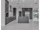 Sleek kitchen with a gray island, modern appliances, and stylish cabinetry, perfect for cooking at 2827 Richmar Ave, Henderson, NV 89074