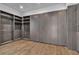 Spacious walk-in closet with shelves and hardwood floors at 2827 Richmar Ave, Henderson, NV 89074