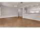 Open living room with tile floors, recessed lights, and an opening to the kitchen at 2832 Goldcreek St, Henderson, NV 89052