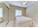 Comfortable bedroom with mirrored closet doors and ample natural light at 3032 Stratmoor Hills Ave, Henderson, NV 89052
