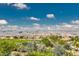 Picturesque community view overlooking lush greenery, homes, and distant mountains at 3032 Stratmoor Hills Ave, Henderson, NV 89052