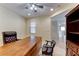 Bright office space with a wooden desk and large window, perfect for working from home at 3032 Stratmoor Hills Ave, Henderson, NV 89052