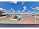 Large community pool with ample lounge chairs and scenic views at 3032 Stratmoor Hills Ave, Henderson, NV 89052