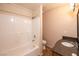Bathroom featuring tub with shower and granite sink vanity at 3145 E Flamingo Rd # 2119, Las Vegas, NV 89121