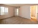 Neutral bedroom featuring wall to wall carpet, and window view at 3145 E Flamingo Rd # 2119, Las Vegas, NV 89121