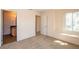Bedroom with carpet, bright window, and ensuite bathroom at 3145 E Flamingo Rd # 2119, Las Vegas, NV 89121