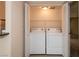 Laundry closet featuring a pair of white washing machines at 3145 E Flamingo Rd # 2119, Las Vegas, NV 89121
