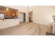 Inviting living room with neutral carpet, adjoining the kitchen with a breakfast bar for casual dining at 3145 E Flamingo Rd # 2119, Las Vegas, NV 89121
