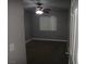Standard bedroom features a ceiling fan, carpeted floors, and a window letting in natural light at 3507 Pointe Vedra Ct, Las Vegas, NV 89122