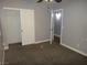 Bedroom with neutral carpet, closet, and a ceiling fan, creating a comfortable atmosphere at 3507 Pointe Vedra Ct, Las Vegas, NV 89122
