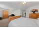 This bedroom includes a bed, dresser, wardrobe and a small workspace at 3561 Yorba Linda Dr, Las Vegas, NV 89122