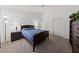 This bedroom features carpet floors, a closet and a queen size bed at 3561 Yorba Linda Dr, Las Vegas, NV 89122