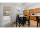 Eat in kitchen with a small table and chairs with natural lighting at 3561 Yorba Linda Dr, Las Vegas, NV 89122
