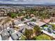 Community aerial view showcasing mature landscaping, swimming pool and green space at 3710 E Oquendo Rd, Las Vegas, NV 89120