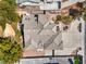 Overhead aerial view of a house featuring an intricate tile roof design, well-kept landscaping, and a spacious driveway at 3710 E Oquendo Rd, Las Vegas, NV 89120