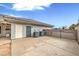 Rear exterior with A/C units, and a gated fence at 3710 E Oquendo Rd, Las Vegas, NV 89120