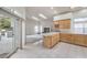 Bright kitchen featuring a breakfast bar and views of the outdoor living area at 3710 E Oquendo Rd, Las Vegas, NV 89120