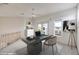 Bright, functional home office with modern desk, balcony access, and plenty of natural light at 3710 E Oquendo Rd, Las Vegas, NV 89120