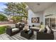 Inviting outdoor patio with comfortable seating and stylish decor perfect for entertaining guests at 3710 E Oquendo Rd, Las Vegas, NV 89120