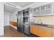 Contemporary kitchen with stainless steel appliances and modern wood cabinetry at 3722 Las Vegas Blvd # 2204, Las Vegas, NV 89158