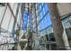 An elegant building lobby with tall windows, stairs, and seating areas at 3722 Las Vegas Blvd # 2204, Las Vegas, NV 89158