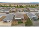 Features a backyard with covered patio, hot tub, and desert landscape at 4096 E Cactus Canyon Dr, Pahrump, NV 89061