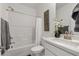Clean bathroom featuring a shower-tub combo, stylish decor, and a modern vanity at 4096 E Cactus Canyon Dr, Pahrump, NV 89061