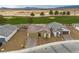 Charming single-story home featuring desert landscaping, neutral tones, and a two-car garage at 4096 E Cactus Canyon Dr, Pahrump, NV 89061