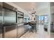 Efficient kitchenette featuring stainless steel appliances and modern finishes at 4381 W Flamingo Rd # 2608, Las Vegas, NV 89103