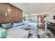 Open living space including a sleek sofa, work space, and modern kitchenette at 4381 W Flamingo Rd # 2608, Las Vegas, NV 89103
