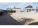 Spacious backyard with gravel landscaping, offering a low-maintenance and versatile outdoor space at 4417 Rita Dr, Las Vegas, NV 89121