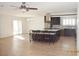 Bright kitchen includes a large island with seating, stainless appliances, and sliding doors at 4417 Rita Dr, Las Vegas, NV 89121