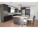 Modern kitchen with a large island, stainless steel appliances, and built-in wine cooler at 4417 Rita Dr, Las Vegas, NV 89121