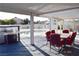Covered patio with outdoor dining set and barbeque grill at 4417 Rita Dr, Las Vegas, NV 89121