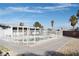 Backyard swimming pool with views of palm trees, blending relaxation with a tropical oasis at 4417 Rita Dr, Las Vegas, NV 89121