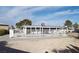 Backyard pool with white fence and patio cover, ideal for summer enjoyment and outdoor activities at 4417 Rita Dr, Las Vegas, NV 89121