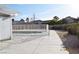 Backyard view of pool with pool fence and landscaping. Ideal for cooling off during the Summer months at 4417 Rita Dr, Las Vegas, NV 89121