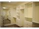 Spacious walk-in closet with custom built-in shelves, drawers, and ample storage, offering organized luxury at 4417 Rita Dr, Las Vegas, NV 89121